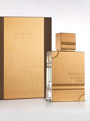 Al Haramain Amber Oud Gold Edition - Perfume árabe para mujeres y hombres - Eau de Parfum en espray con notas de bergamota, melón, piña, ámbar, acorde amaderado y almizcle, 2 onzas